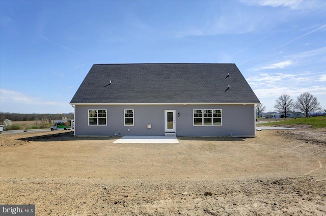 back of house featuring a patio area