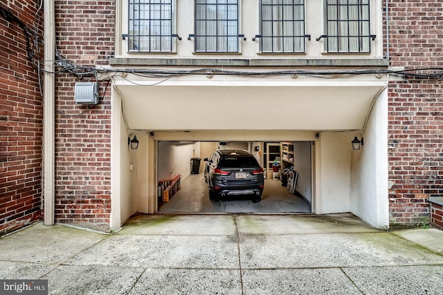 garage featuring a carport