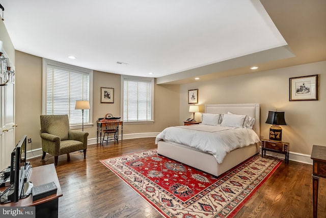 bedroom featuring dark hardwood / wood-style floors