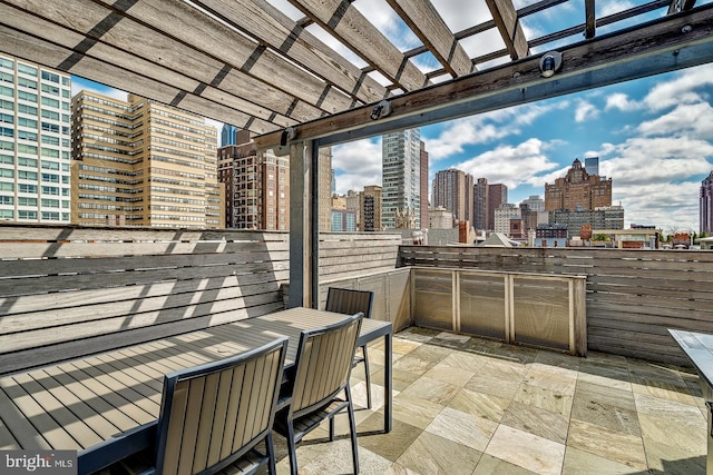 view of terrace with a pergola