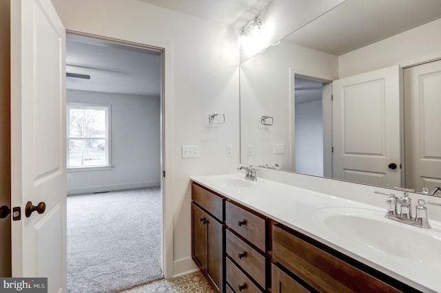 bathroom featuring double sink and large vanity