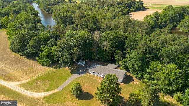 birds eye view of property featuring a rural view and a water view