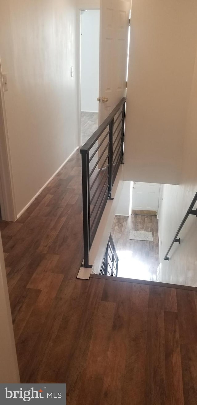 staircase with light wood-type flooring