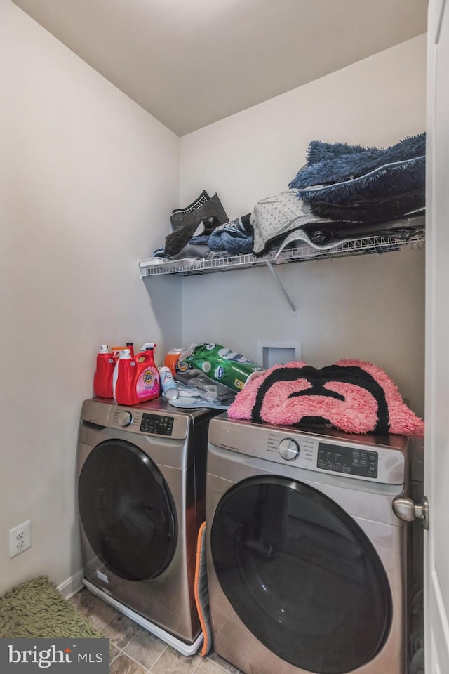 laundry room featuring independent washer and dryer, washer hookup, and tile flooring