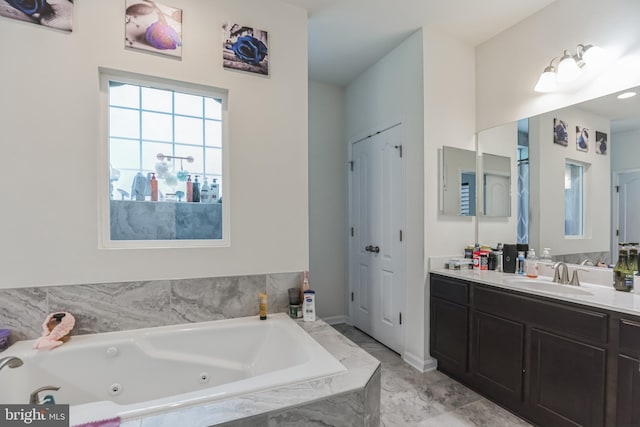 bathroom with vanity with extensive cabinet space and tile floors