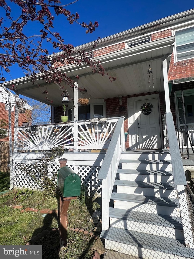 exterior space featuring covered porch