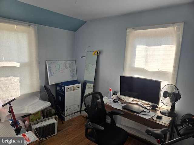 office space with hardwood / wood-style floors and vaulted ceiling