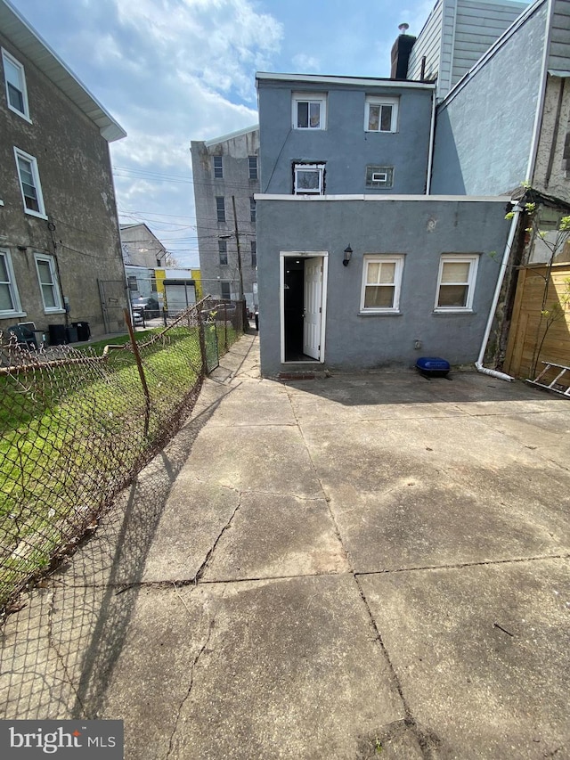 rear view of house with a patio area