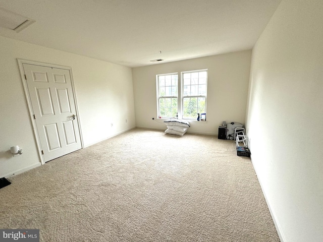 spare room with carpet flooring