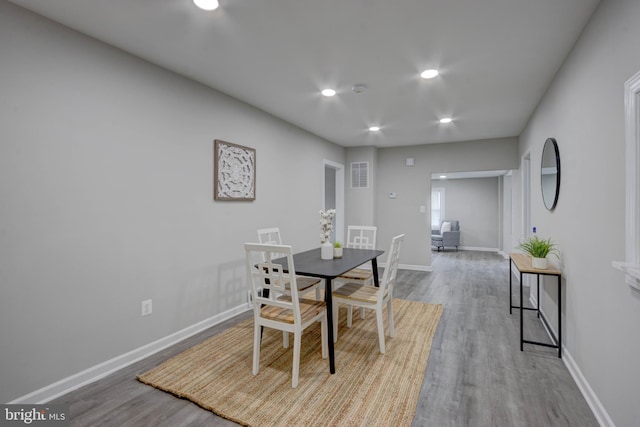 dining space featuring light hardwood / wood-style floors