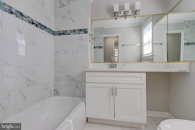 bathroom with vanity and tiled shower / bath combo