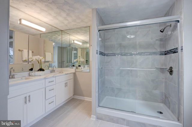 bathroom featuring vanity and walk in shower