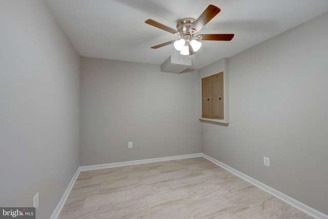 spare room with ceiling fan