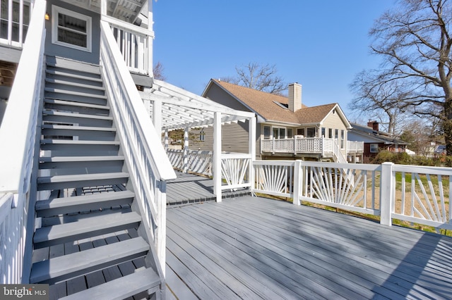 deck featuring a pergola