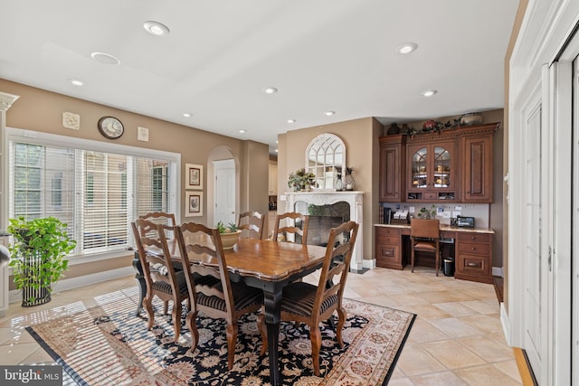 tiled dining space with plenty of natural light