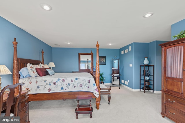 bedroom with light carpet