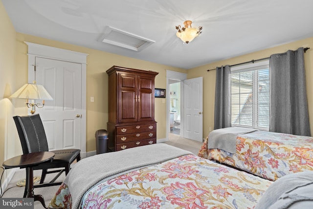 bedroom with light colored carpet