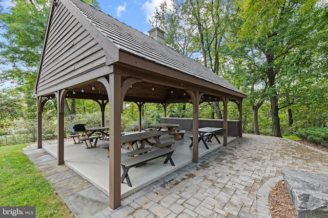 view of home's community with a patio area and a gazebo