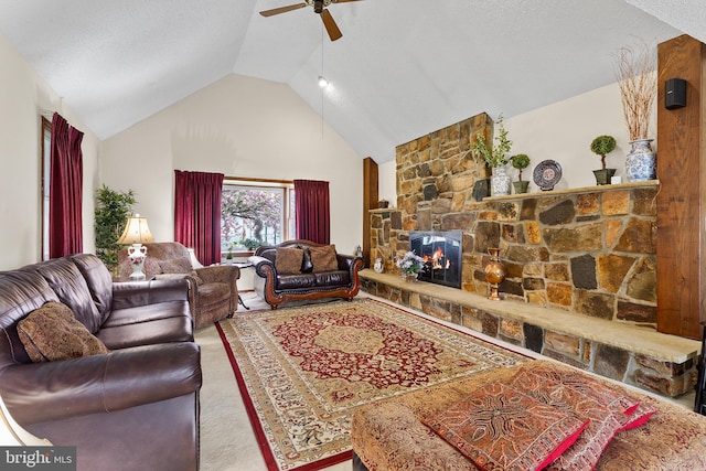 living room with light carpet, high vaulted ceiling, a fireplace, ceiling fan, and a textured ceiling