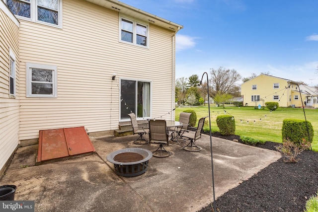 view of patio / terrace featuring a fire pit