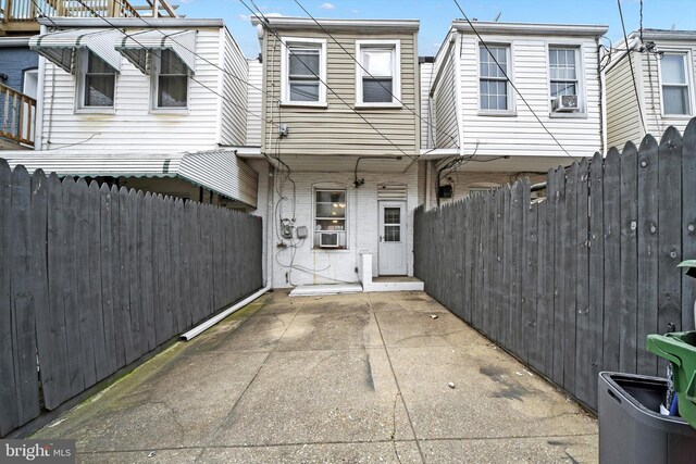 view of front of home featuring a patio