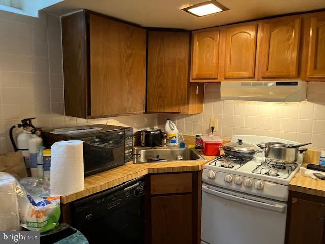 kitchen with sink, dishwasher, backsplash, and white range with gas stovetop