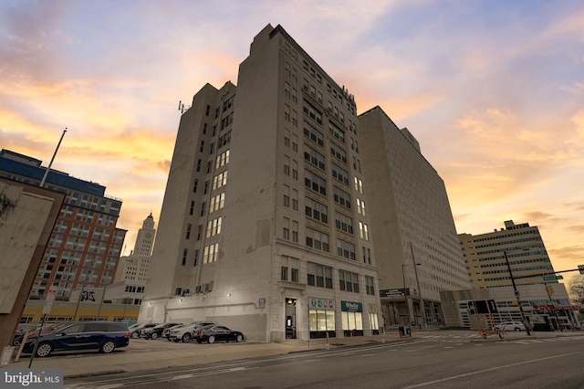 view of outdoor building at dusk