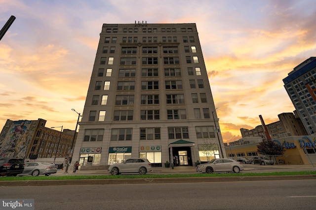 view of outdoor building at dusk