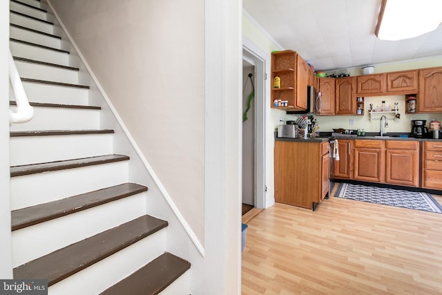 kitchen with sink and light wood-type flooring