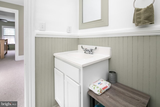 bathroom featuring vanity with extensive cabinet space