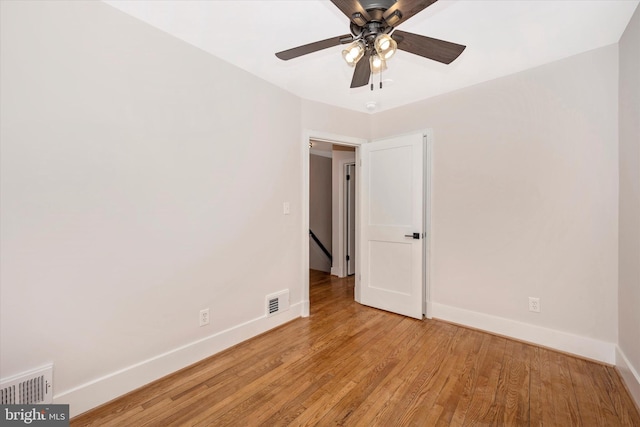 unfurnished room featuring ceiling fan and light hardwood / wood-style floors