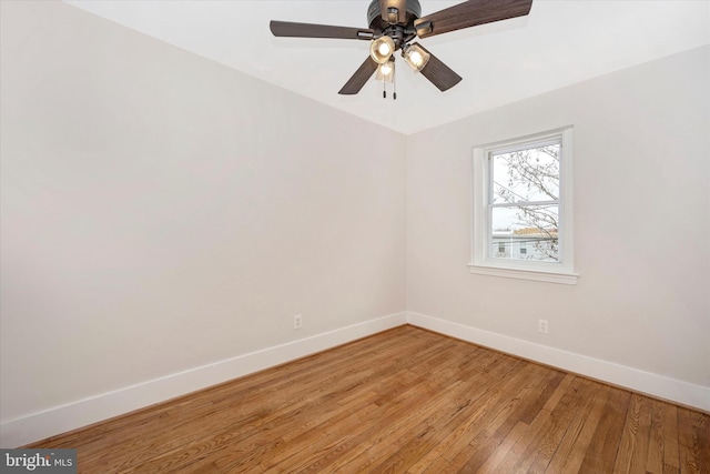 unfurnished room with wood-type flooring and ceiling fan