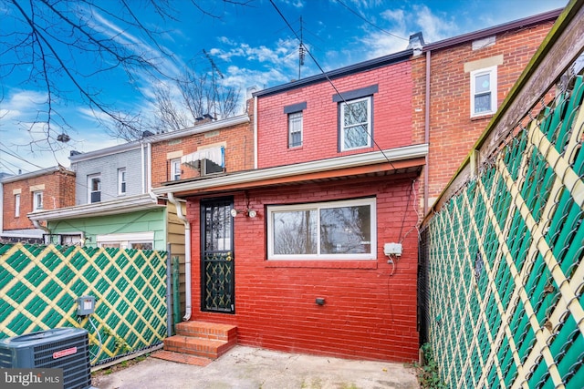 view of front of house featuring central AC unit