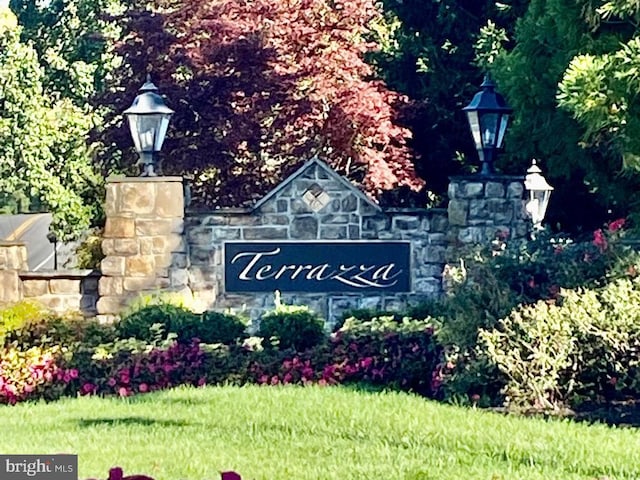 view of community sign