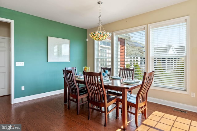 dining room featuring dark hardwood / wood-style floors