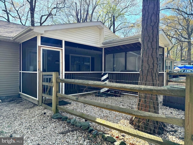 exterior space with a sunroom