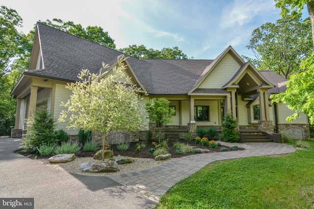 craftsman-style home with covered porch