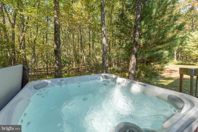 exterior space featuring a hot tub