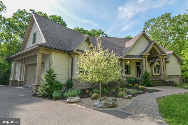 craftsman-style home featuring a garage