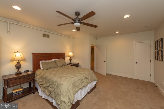 carpeted bedroom with ceiling fan