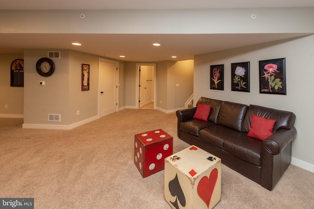 living room featuring light carpet