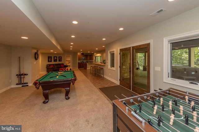 game room with light colored carpet and pool table