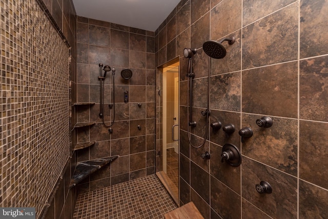 bathroom with a shower with shower door