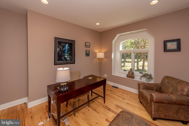 home office with light wood-type flooring