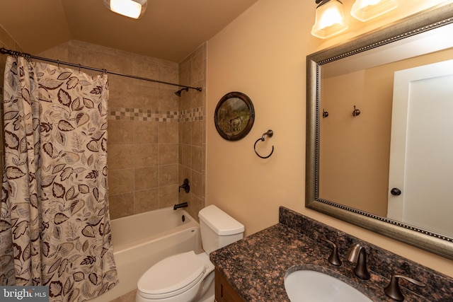 full bathroom featuring vanity, toilet, and shower / bathtub combination with curtain