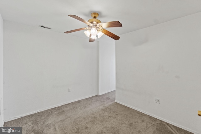 carpeted empty room with ceiling fan