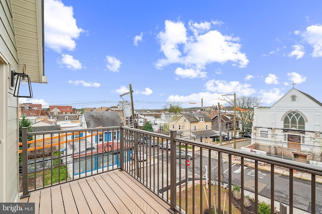 balcony featuring a residential view