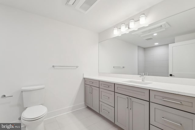 full bathroom with visible vents, tile patterned flooring, baseboards, vanity, and toilet