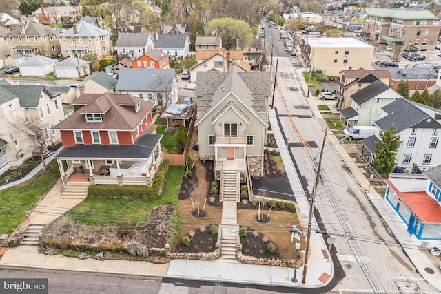 birds eye view of property with a residential view