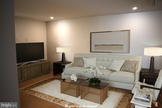 living area with recessed lighting